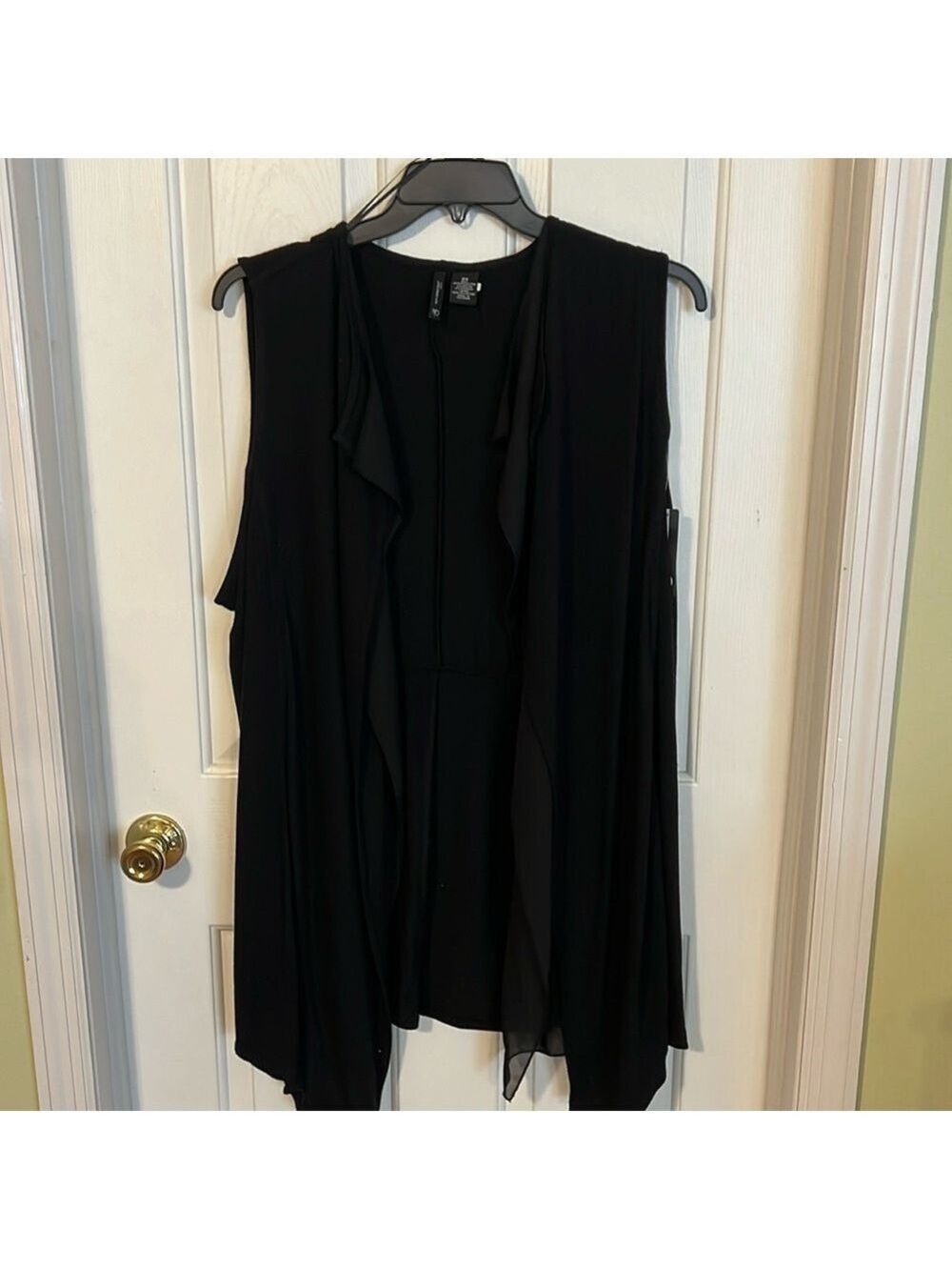New Directions sleeveless cardigan. Size 3X. Preowned. Good condition.